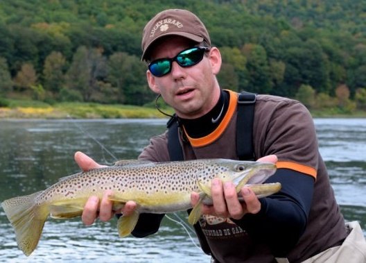 Dennis Cabarle holding a nice brown trout!